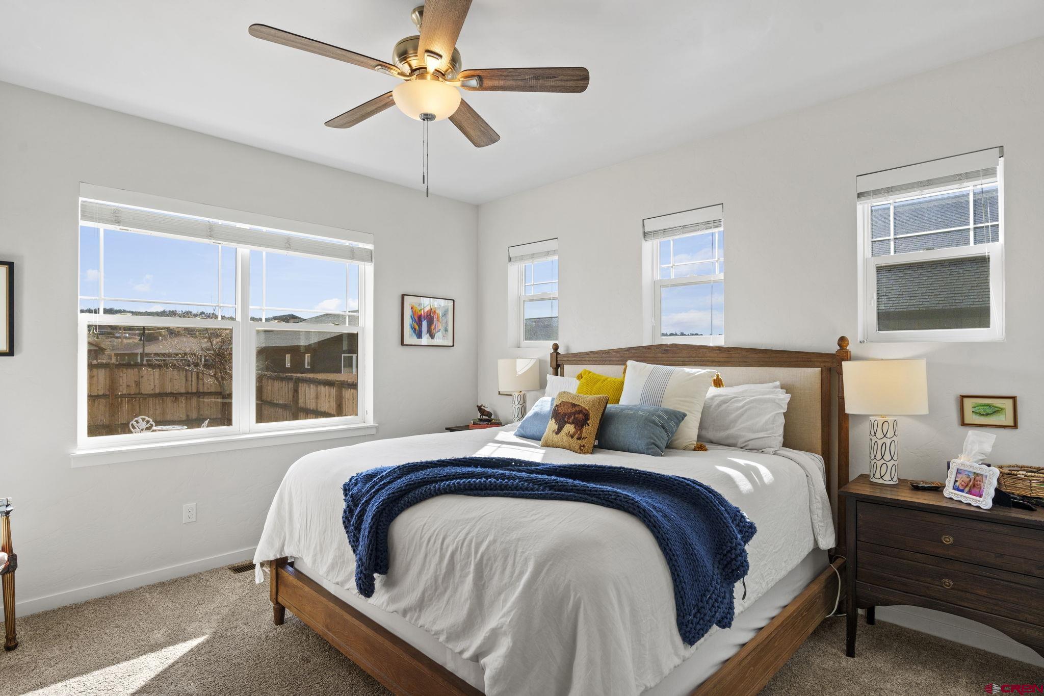 155 Prospector Avenue Durango, CO 81301 - Photo 15 of 35 a bedroom with bed and a window