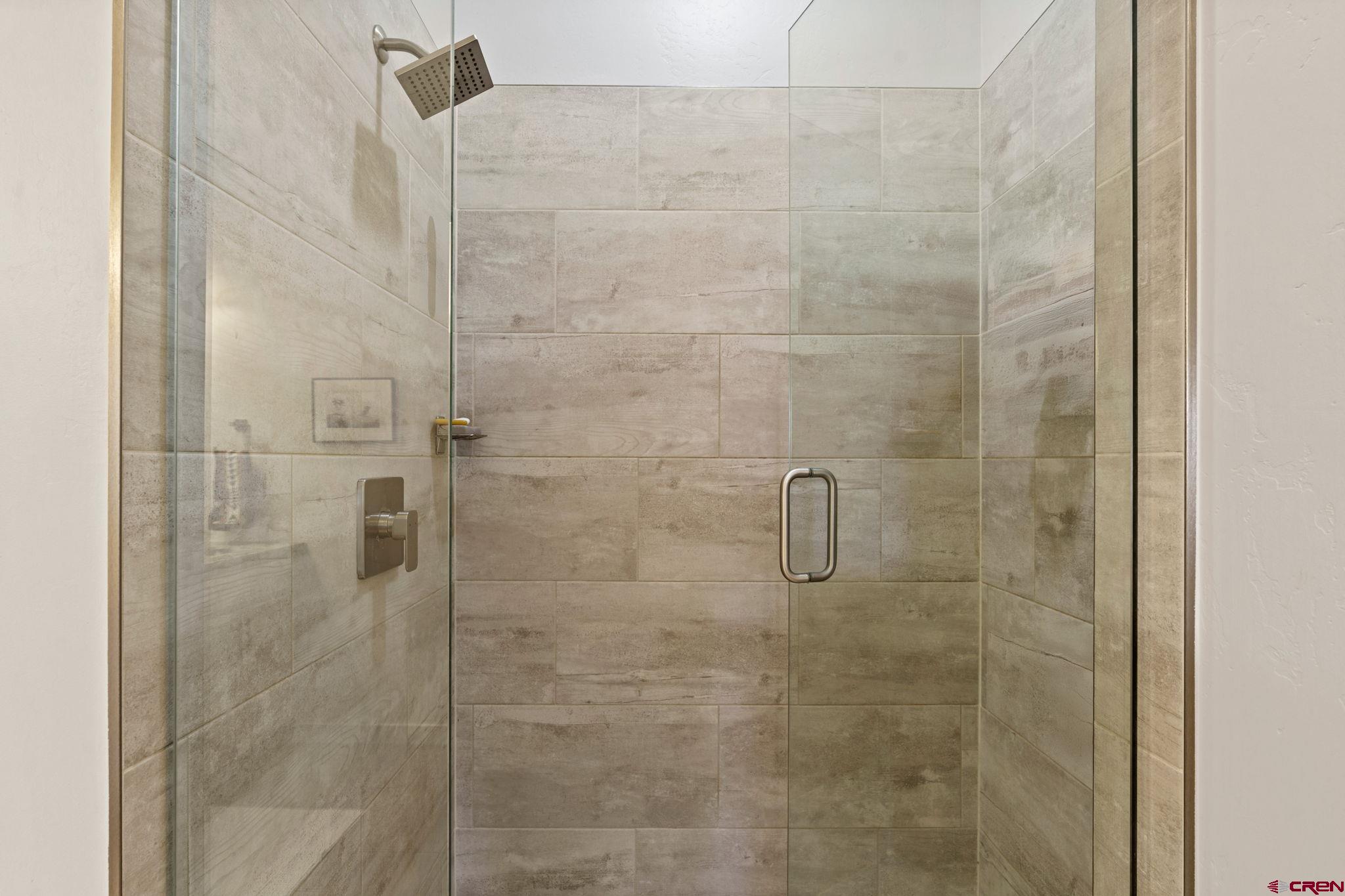 155 Prospector Avenue Durango, CO 81301 - Photo 21 of 35 a bathroom with a shower