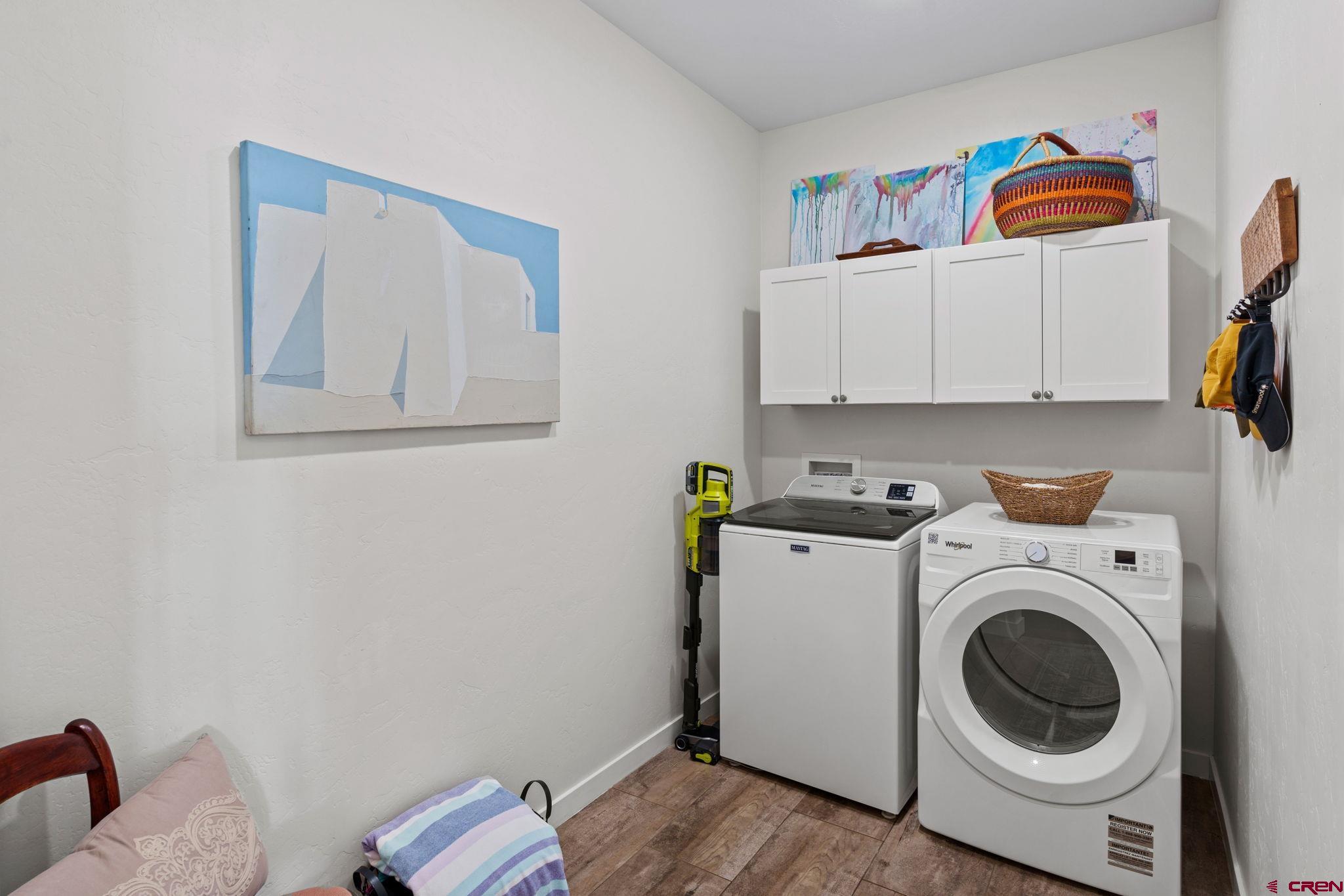 155 Prospector Avenue Durango, CO 81301 - Photo 27 of 35 a utility room with dryer and washer