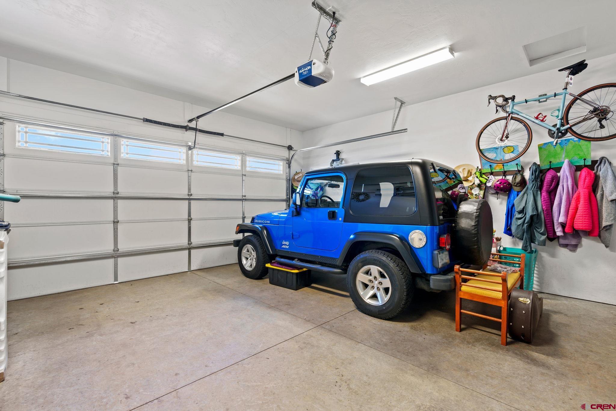 155 Prospector Avenue Durango, CO 81301 - Photo 28 of 35 a view of a garage and car parked