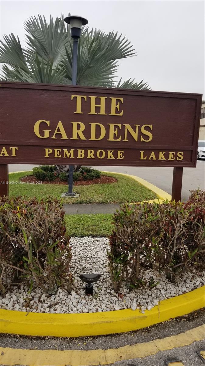 11368 Taft Street, Unit 11368 Pembroke Pines, FL 33026 - Photo 15 of 20 a sign that is on the side of a building