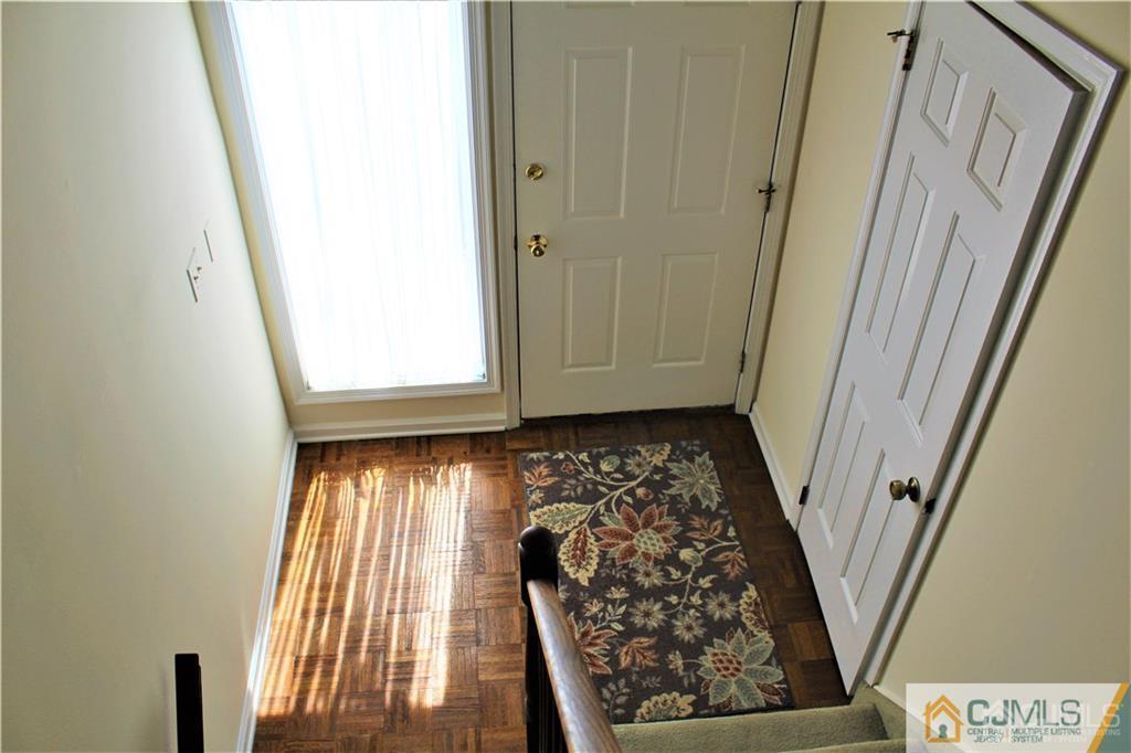 3904 Springbrook Drive, Unit 3904 Edison, NJ 08820 - Photo 2 of 25 a view of an entryway with a window