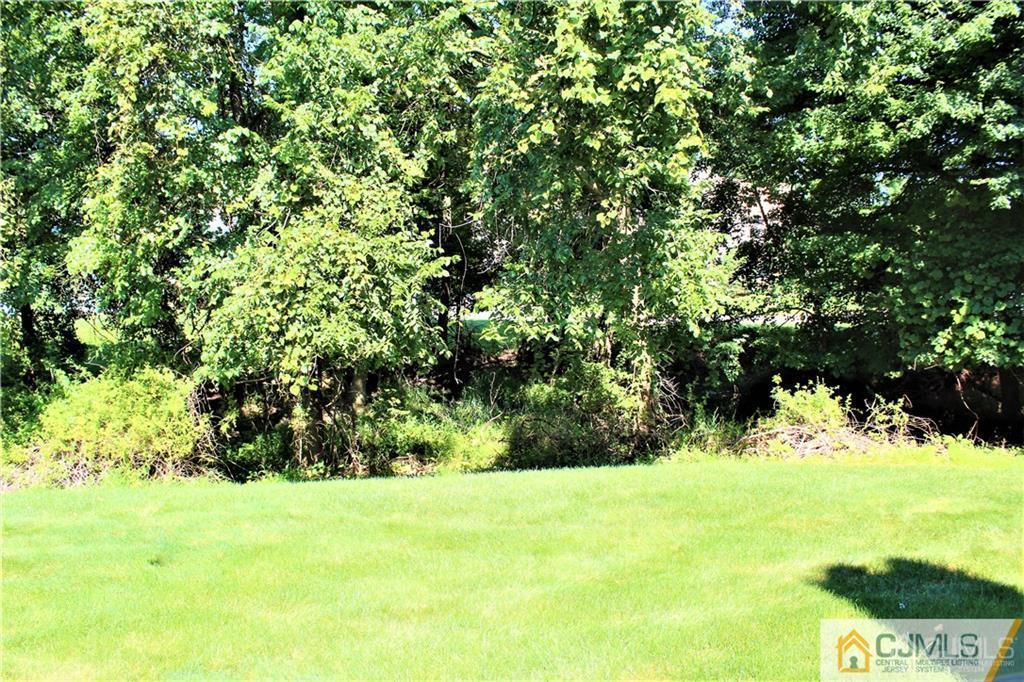 3904 Springbrook Drive, Unit 3904 Edison, NJ 08820 - Photo 24 of 25 a view of yard with green space