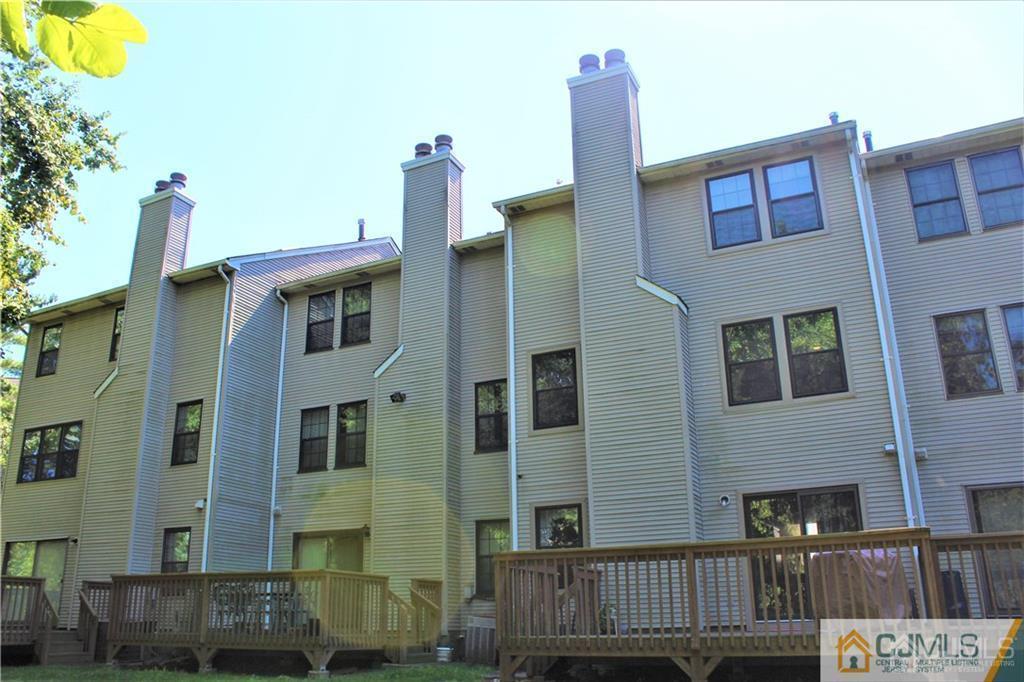 3904 Springbrook Drive, Unit 3904 Edison, NJ 08820 - Photo 25 of 25 a front view of a building