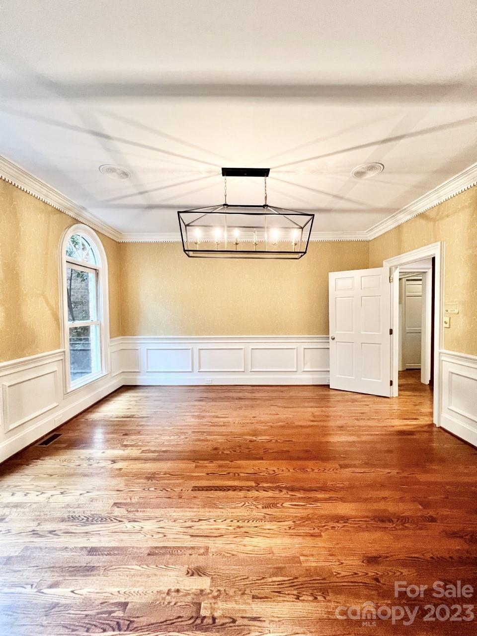5614 Laurium Road Charlotte, NC 28226 - Photo 11 of 40 a view of a room with wooden floor