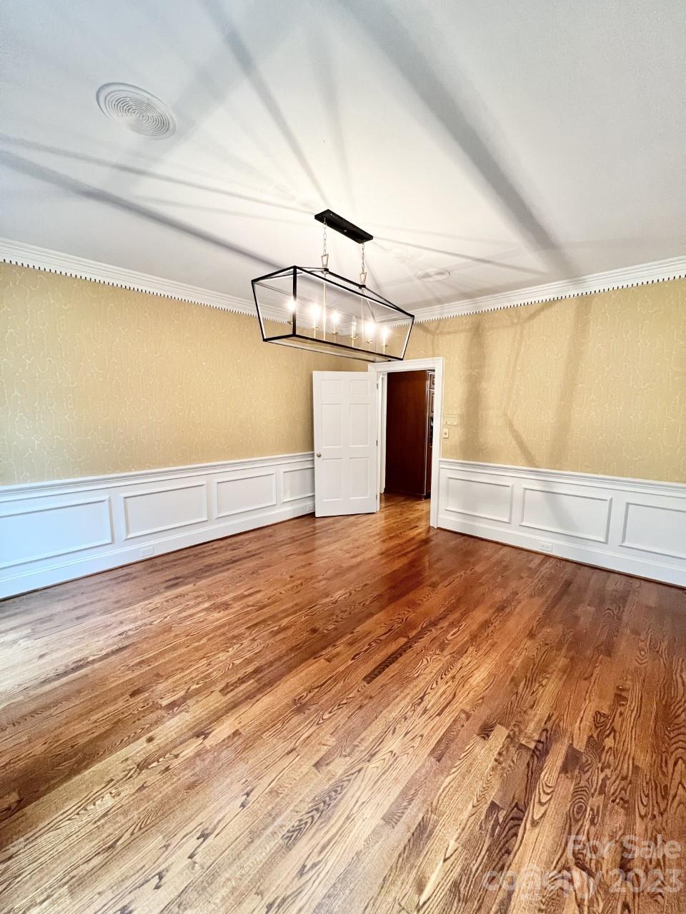 5614 Laurium Road Charlotte, NC 28226 - Photo 12 of 40 a view of a room with wooden floor
