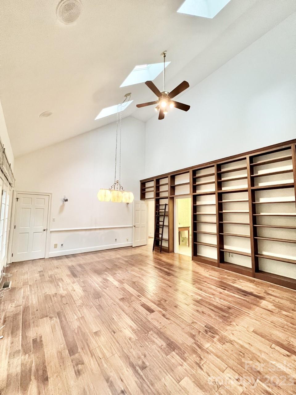 5614 Laurium Road Charlotte, NC 28226 - Photo 15 of 40 a view of a livingroom with a ceiling fan and window