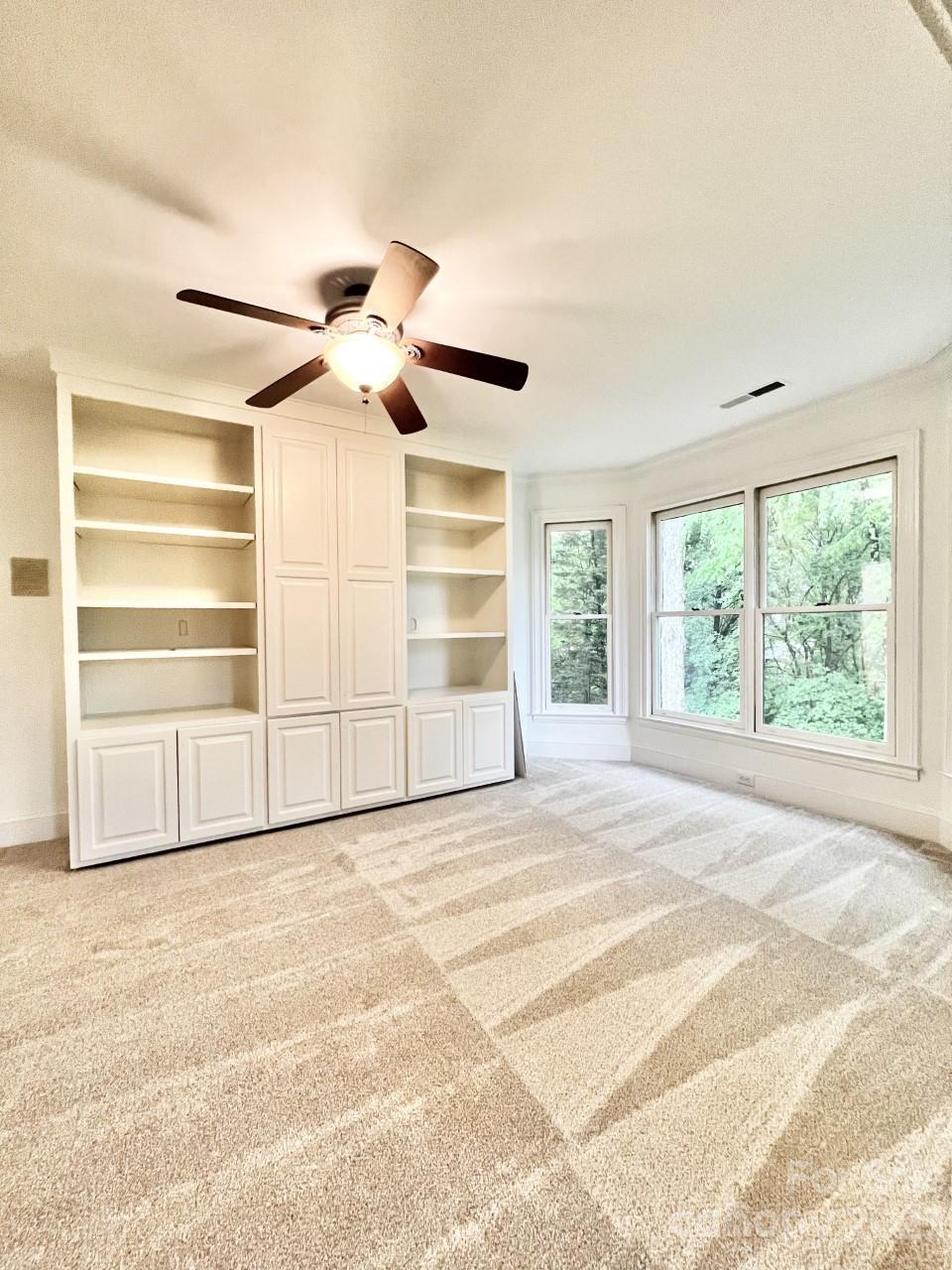 5614 Laurium Road Charlotte, NC 28226 - Photo 20 of 40 a view of an empty room with a window