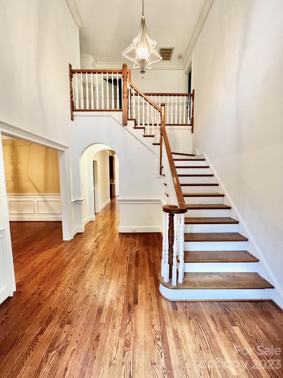 5614 Laurium Road Charlotte, NC 28226 - Photo 2 of 40 a view of entryway and hall with wooden floor