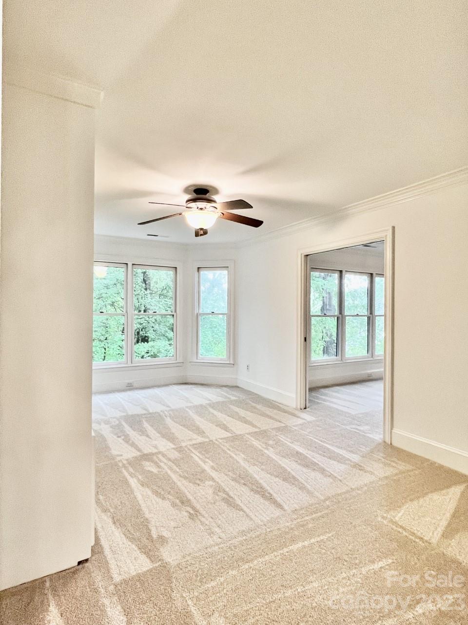 5614 Laurium Road Charlotte, NC 28226 - Photo 21 of 40 a view of an empty room with a window