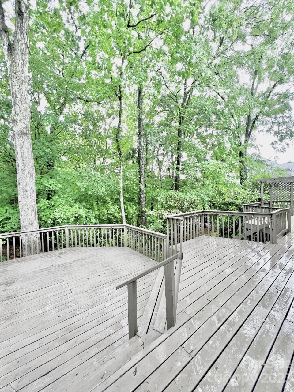5614 Laurium Road Charlotte, NC 28226 - Photo 40 of 40 a view of balcony with deck and wooden floor