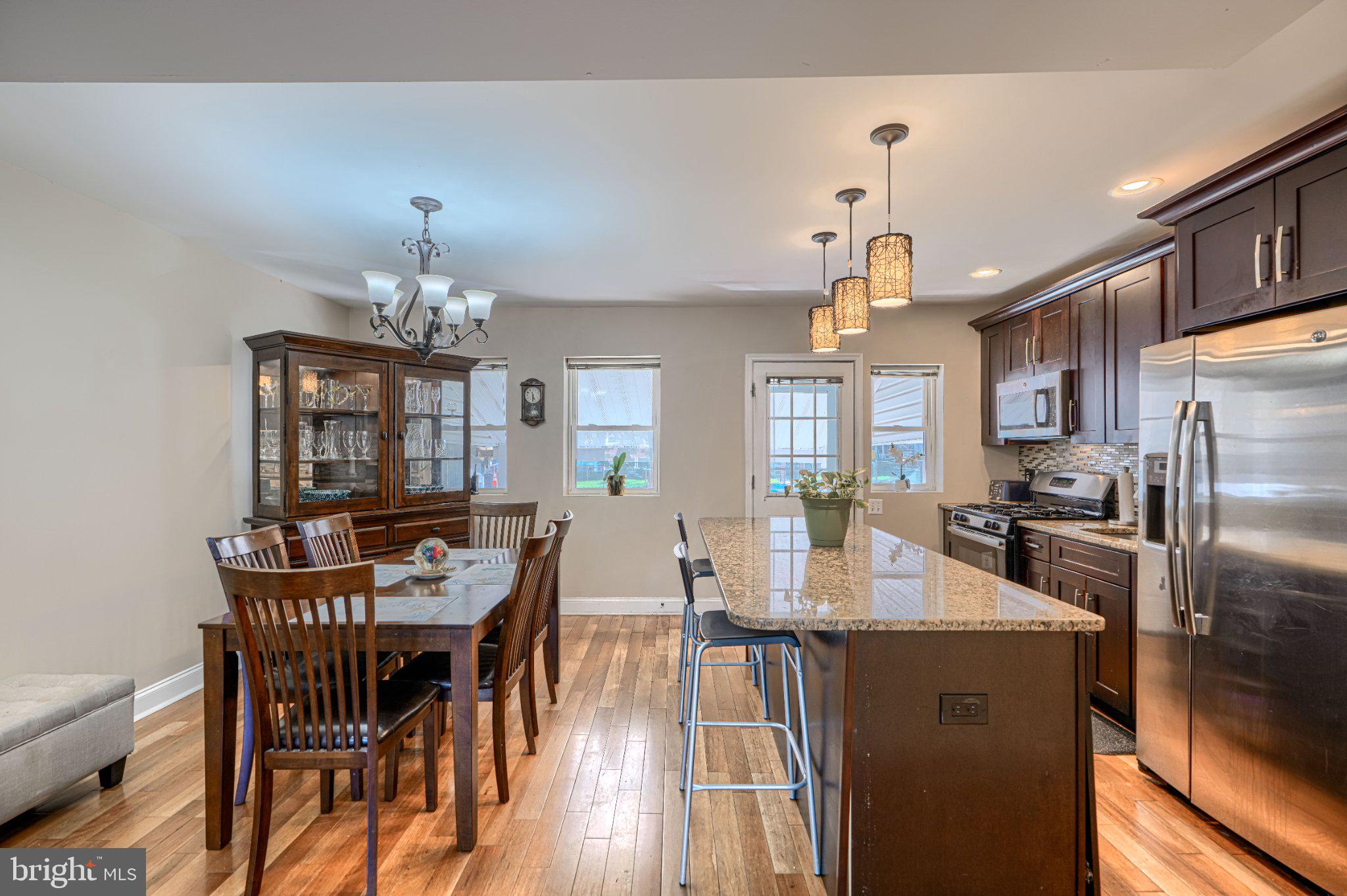 1639 Walterswood Road Baltimore, MD 21239 - Photo 13 of 49 Modern kitchen with warm wood tones.