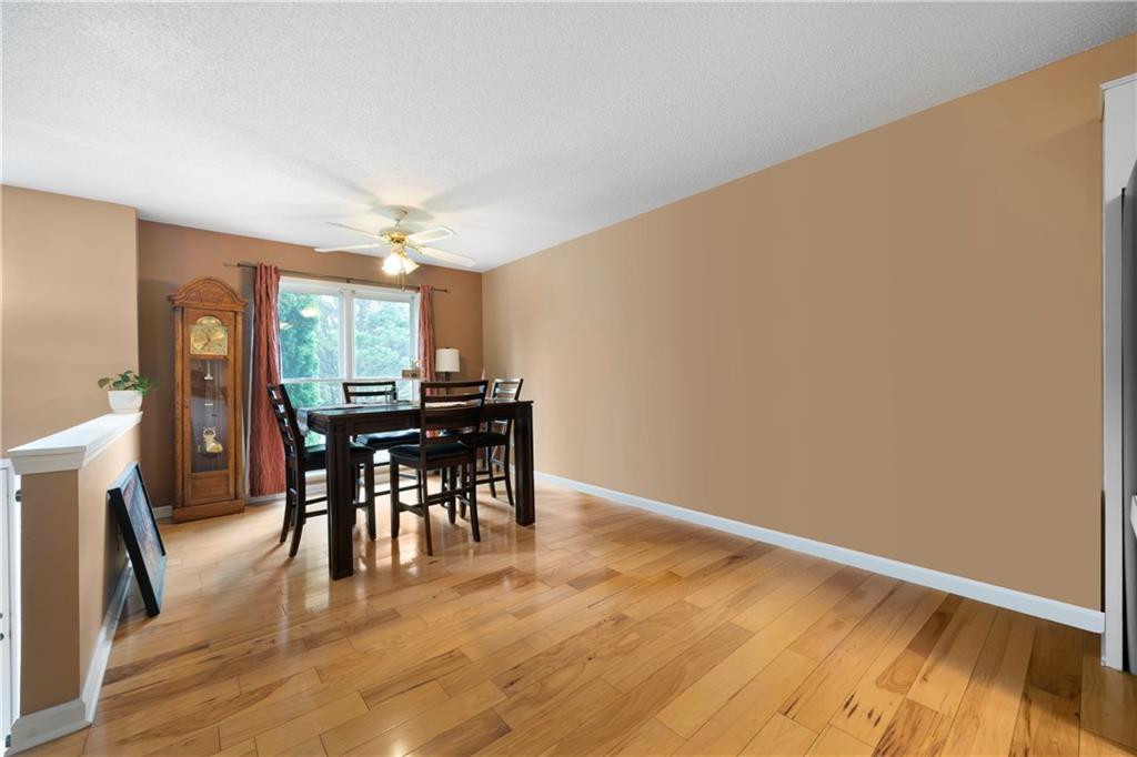 520 Brown Farm Road Southwest Cartersville, GA 30120 - Photo 6 of 16 a view of a dining room with furniture and a chandelier