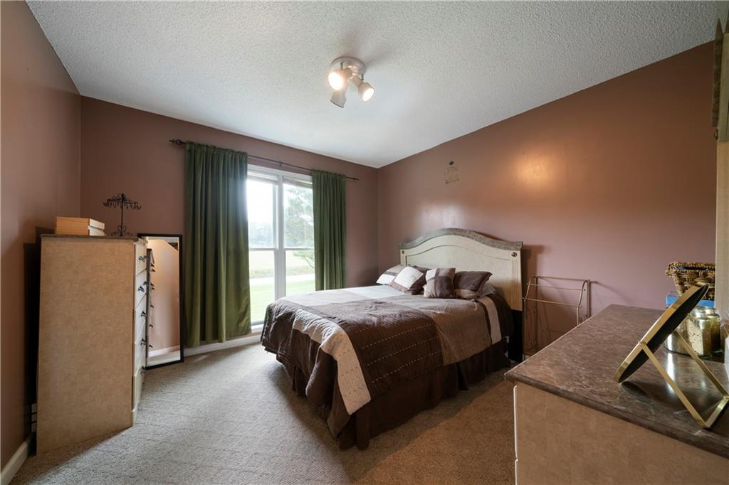 520 Brown Farm Road Southwest Cartersville, GA 30120 - Photo 8 of 16 a bedroom with bed and window