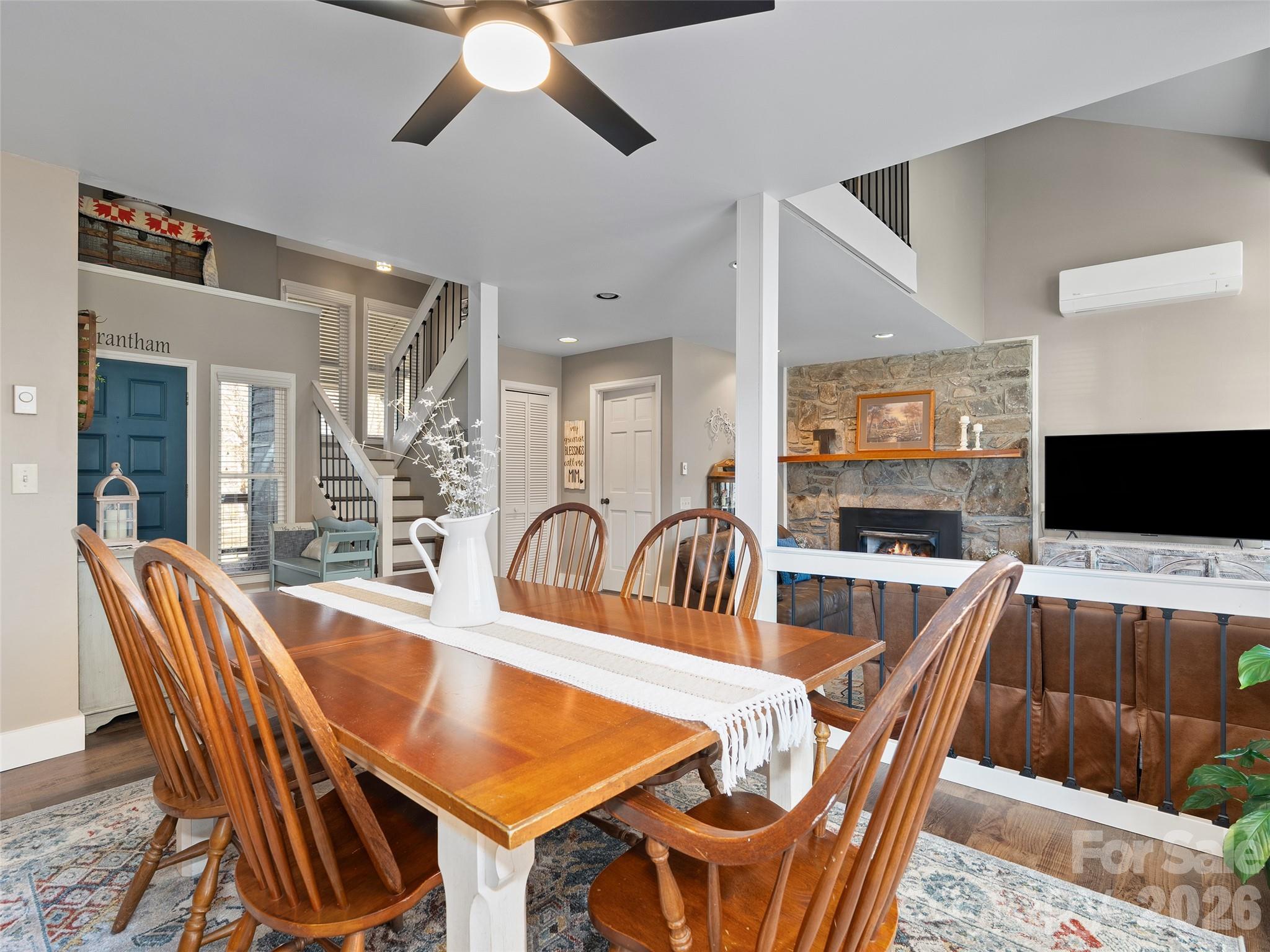 1672 Worley Cove Road Canton, NC 28716 - Photo 14 of 39 a view of a dining room with furniture window and wooden floor