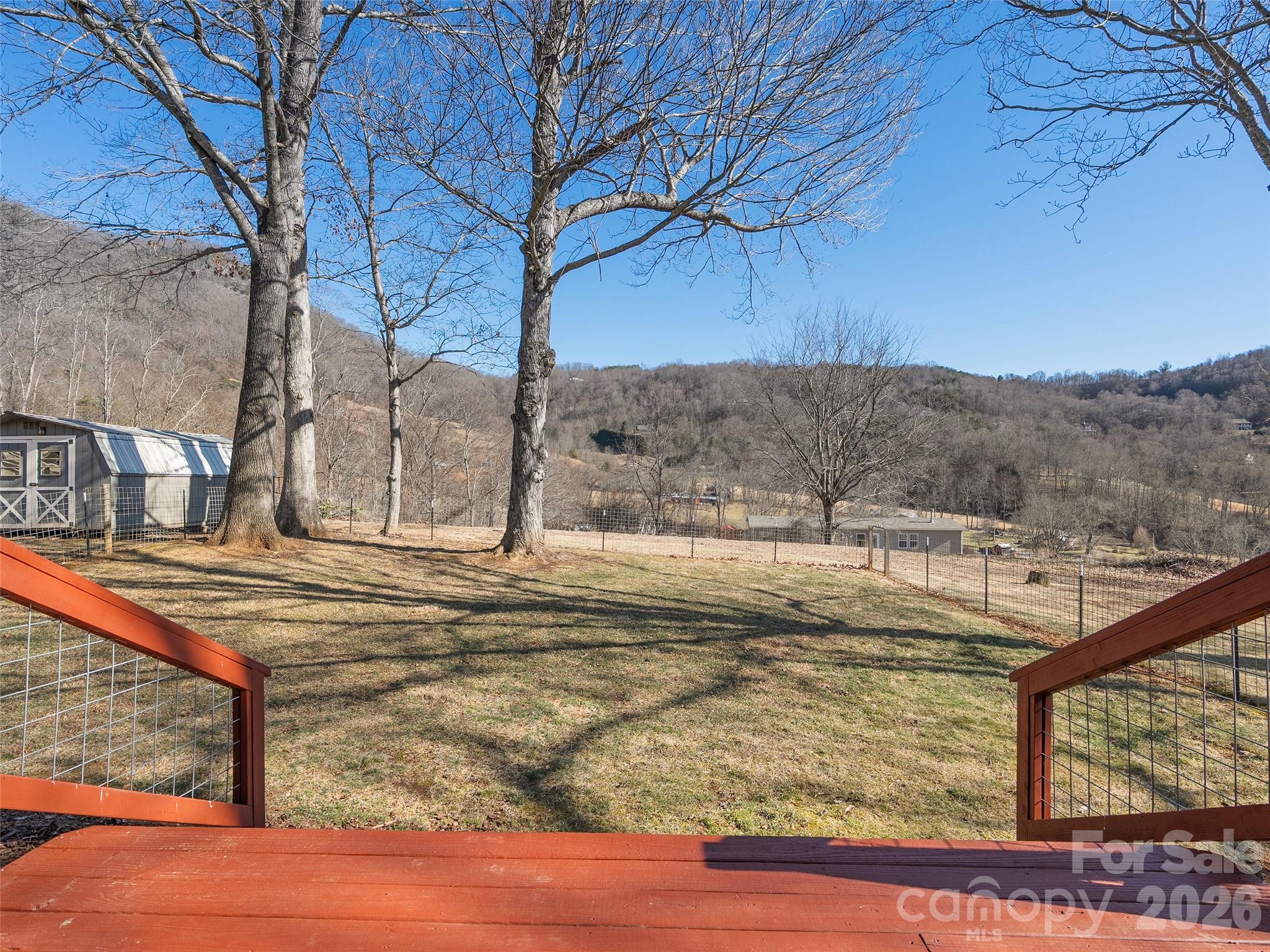 1672 Worley Cove Road Canton, NC 28716 - Photo 16 of 39 a view of swimming pool with a yard