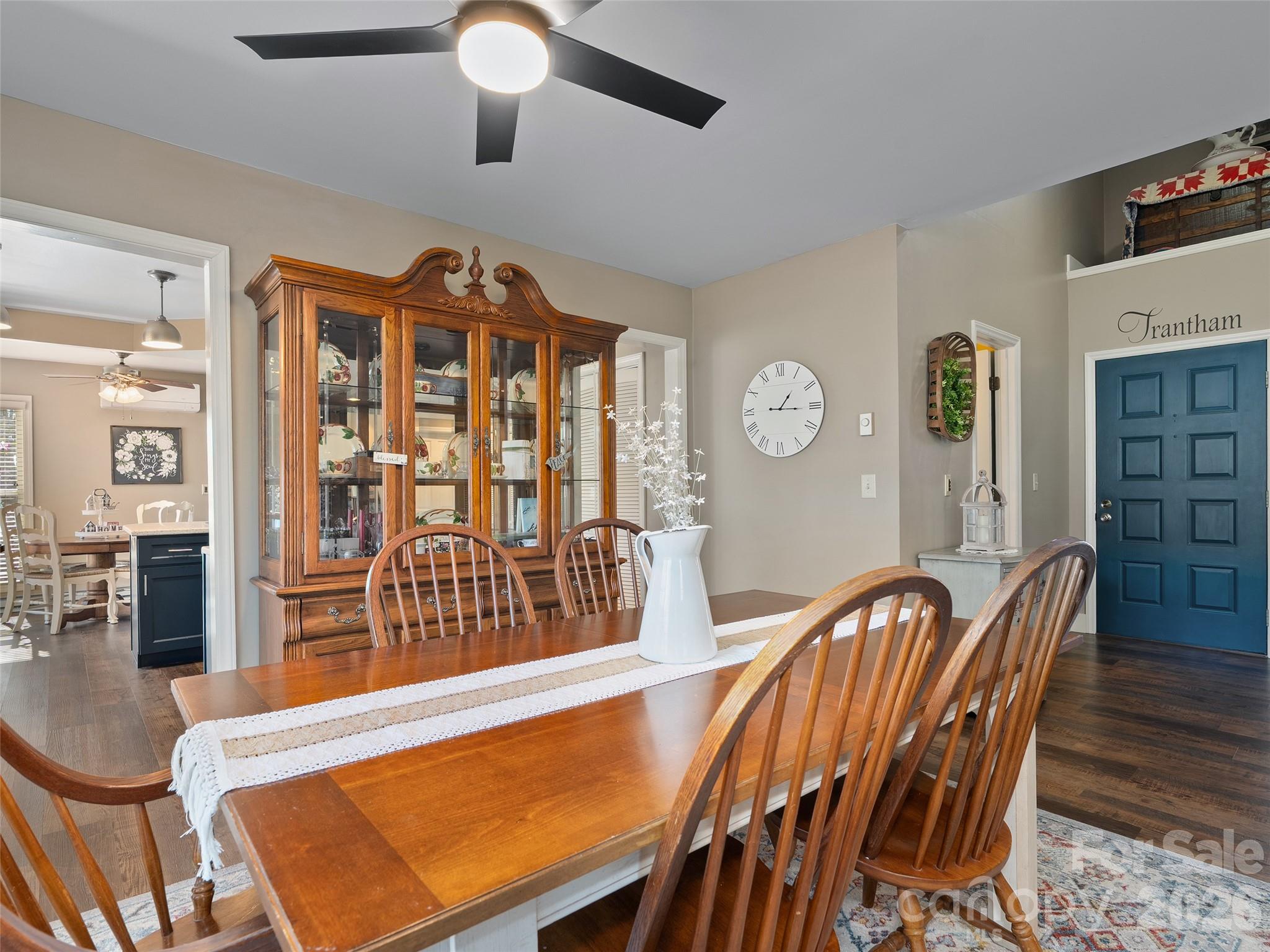 1672 Worley Cove Road Canton, NC 28716 - Photo 17 of 39 a view of a dining room with furniture window and wooden floor