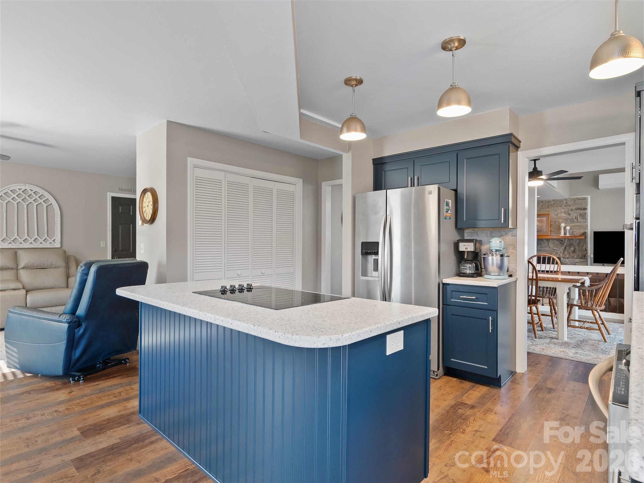 1672 Worley Cove Road Canton, NC 28716 - Photo 18 of 39 a kitchen with refrigerator and cabinets