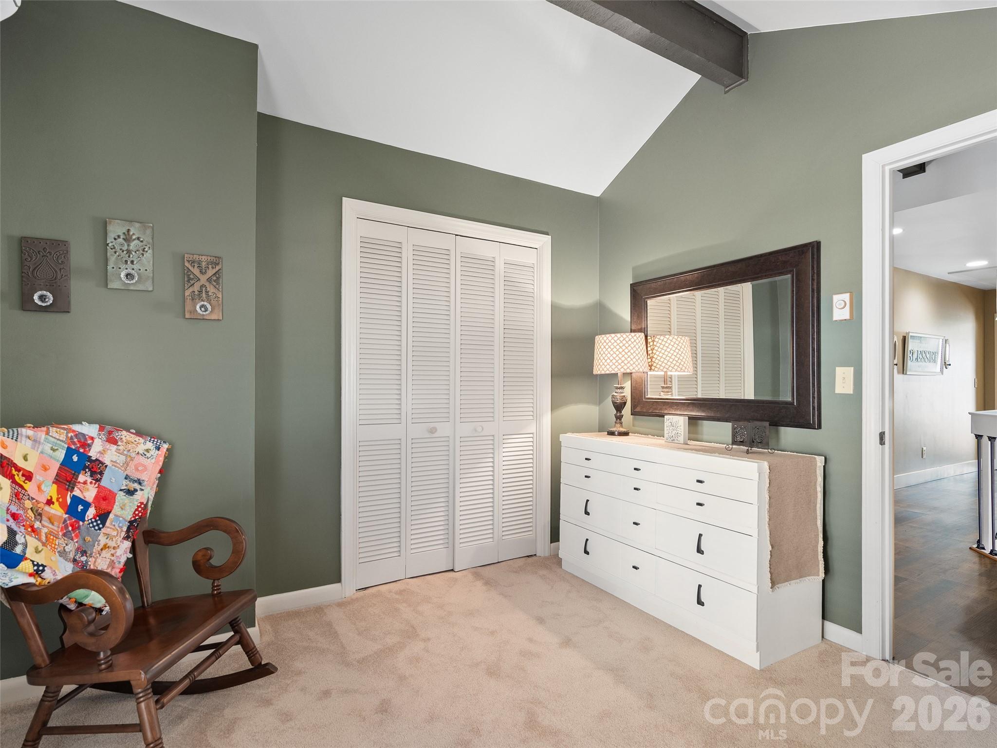 1672 Worley Cove Road Canton, NC 28716 - Photo 27 of 39 a room with furniture and a dresser