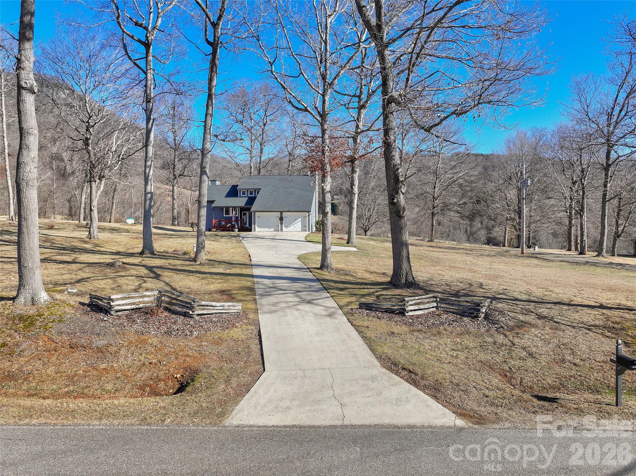 1672 Worley Cove Road Canton, NC 28716 - Photo 37 of 39 a view of a yard with trees