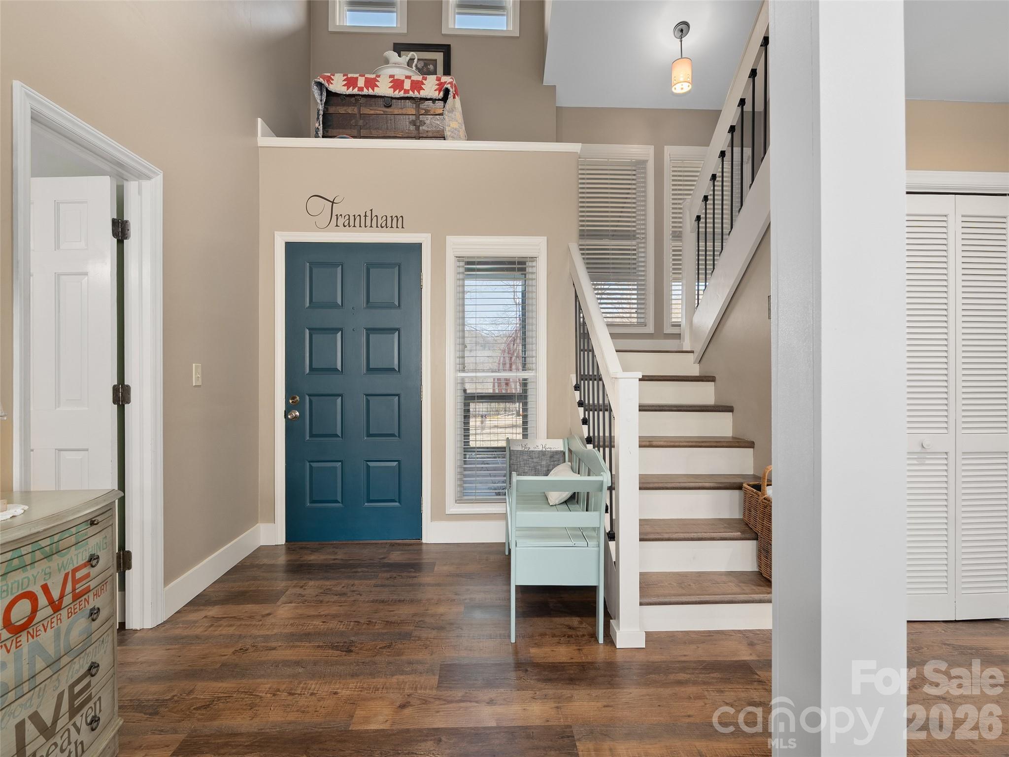 1672 Worley Cove Road Canton, NC 28716 - Photo 9 of 39 a view of entryway with wooden floor and stairs