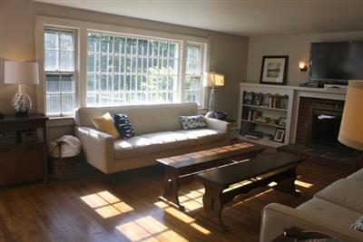 444 County Road Pocasset, MA 02559 - Photo 3 of 14 a living room with furniture and a flat screen tv