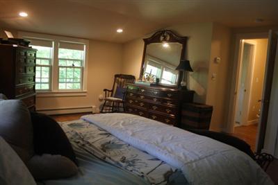 444 County Road Pocasset, MA 02559 - Photo 8 of 14 a bedroom with a bed window and dresser