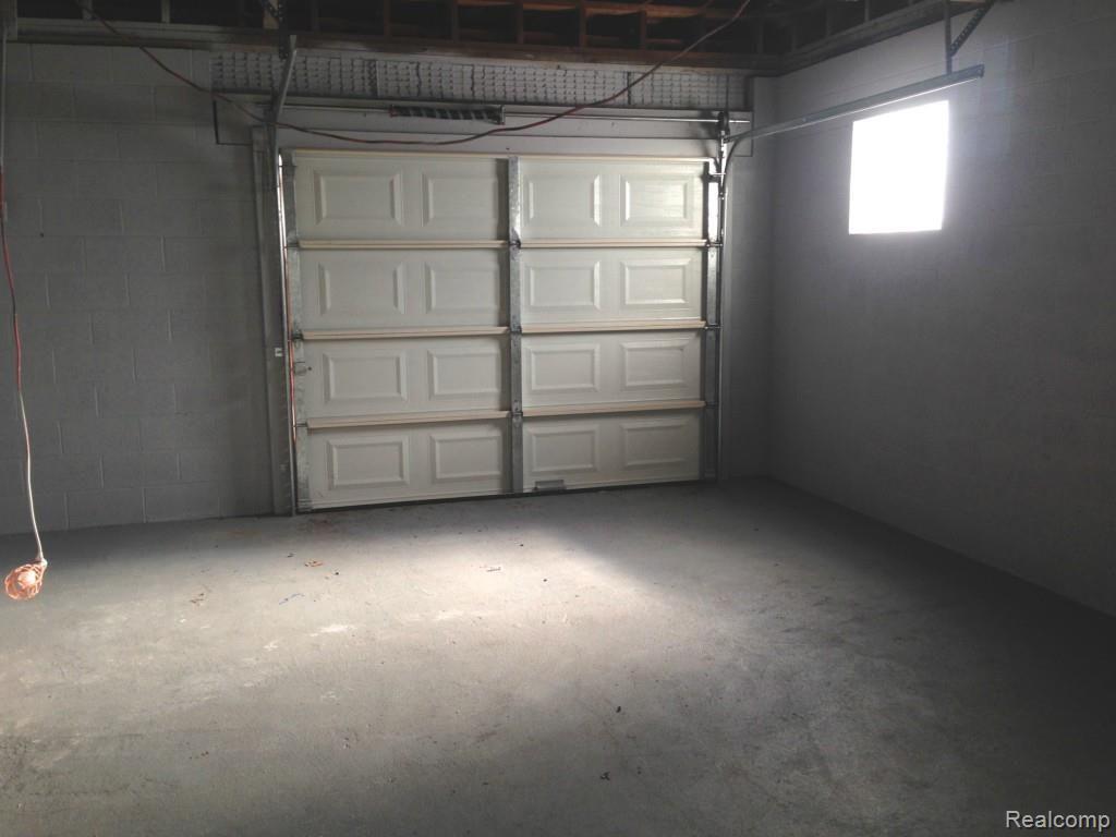 6039 Beech Daly Road Taylor, MI 48180 - Photo 19 of 20 Garage Bay door to backyard