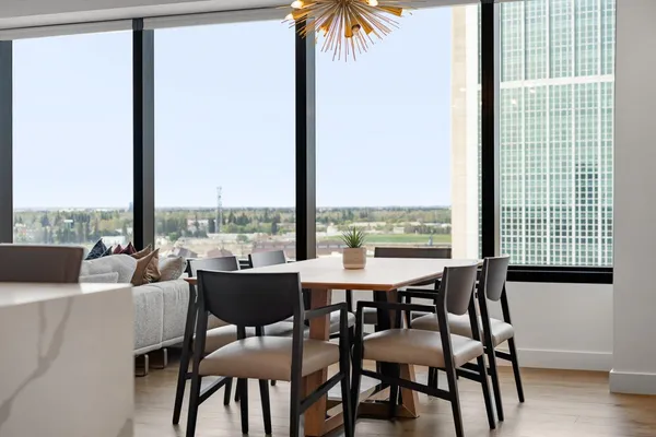 a kitchen with stainless steel appliances a stove and a sink