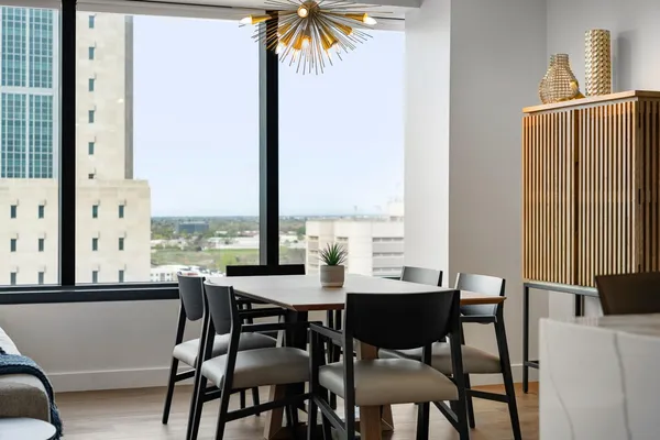 a stove top oven sitting inside of a kitchen