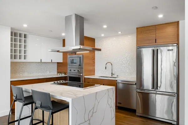 a bedroom with bed and window