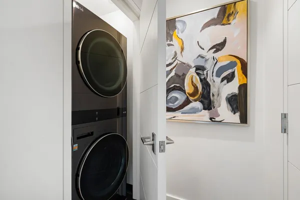 a spacious bathroom with a double vanity sink and a mirror