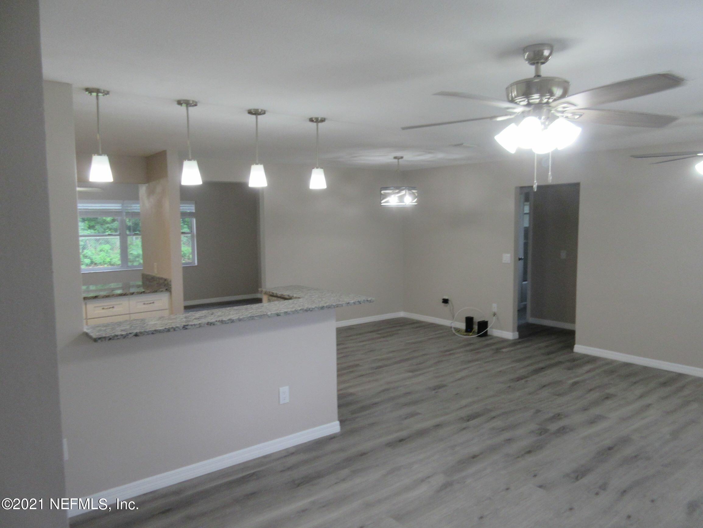 6331 Newmark Street Spring Hill, FL 34606 - Photo 10 of 24 Greg-Forster-12-31-2021_Page_11_Image_00