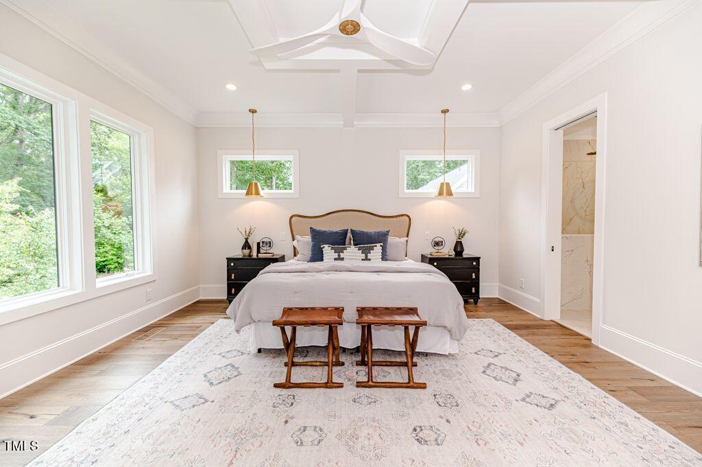 2101 Gresham Lake Road Raleigh, NC 27615 - Photo 15 of 48 a bedroom with a bed and window