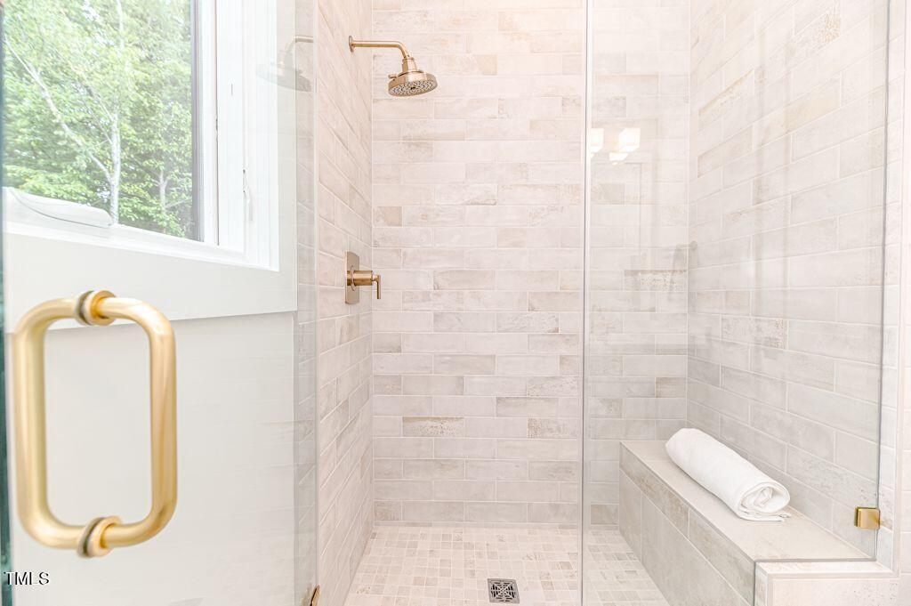 2101 Gresham Lake Road Raleigh, NC 27615 - Photo 27 of 48 a bathroom with a shower