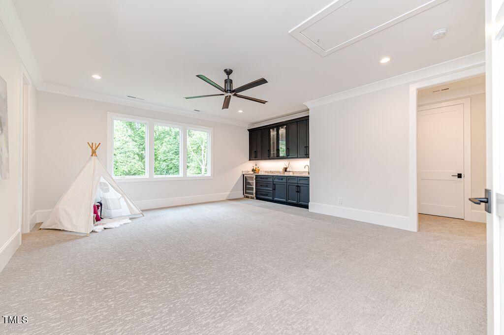 2101 Gresham Lake Road Raleigh, NC 27615 - Photo 35 of 48 a view of livingroom with hardwood floor and ceiling fan