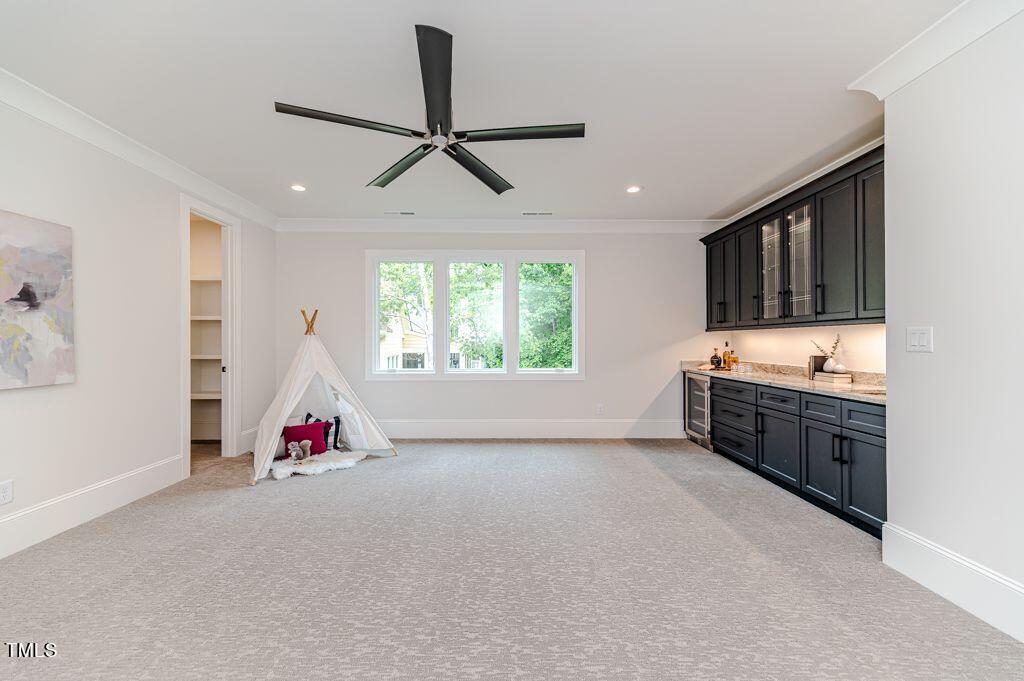 2101 Gresham Lake Road Raleigh, NC 27615 - Photo 36 of 48 a view of livingroom with kitchen and window