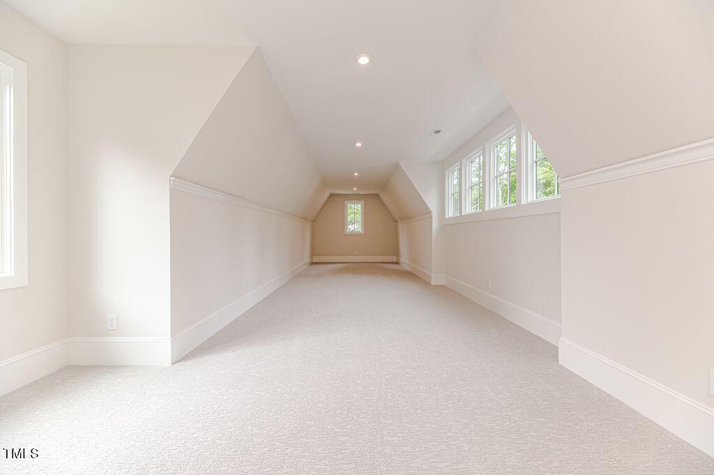2101 Gresham Lake Road Raleigh, NC 27615 - Photo 40 of 48 an empty room with windows and entrance