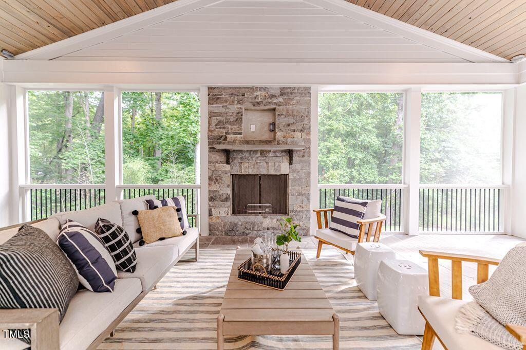 2101 Gresham Lake Road Raleigh, NC 27615 - Photo 42 of 48 a living room with furniture and a fireplace