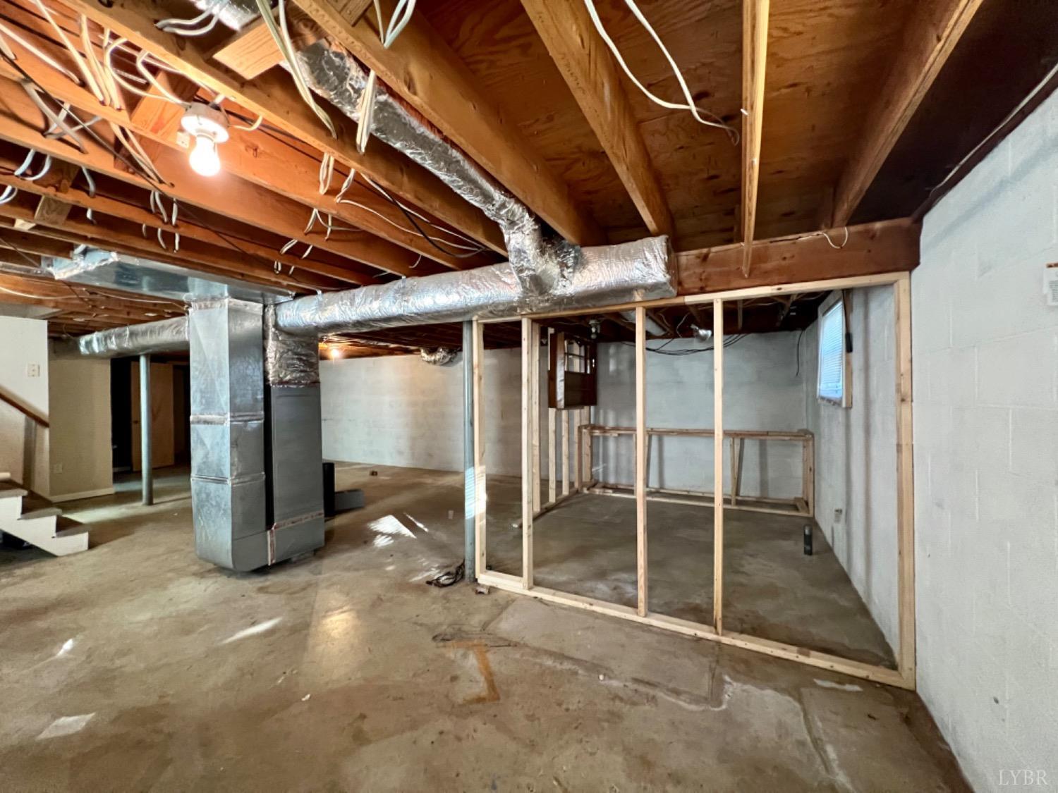 417 Jasper Wood Road Hurt, VA 24563 - Photo 20 of 36 a view of an empty room with wooden walls