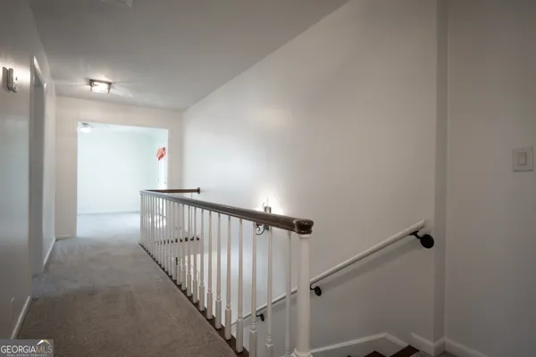 a kitchen with a stove and a microwave