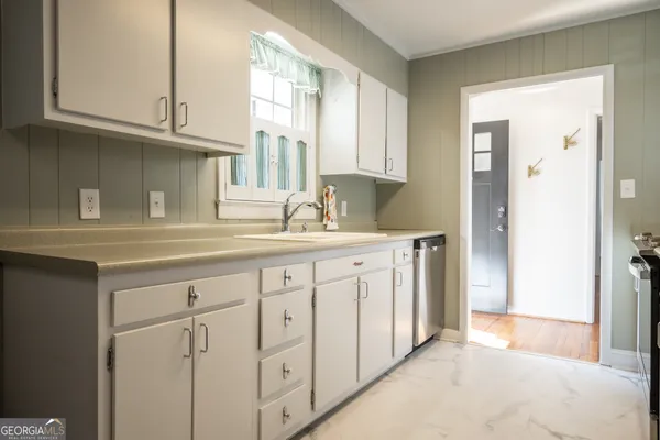 a view of a room with large windows