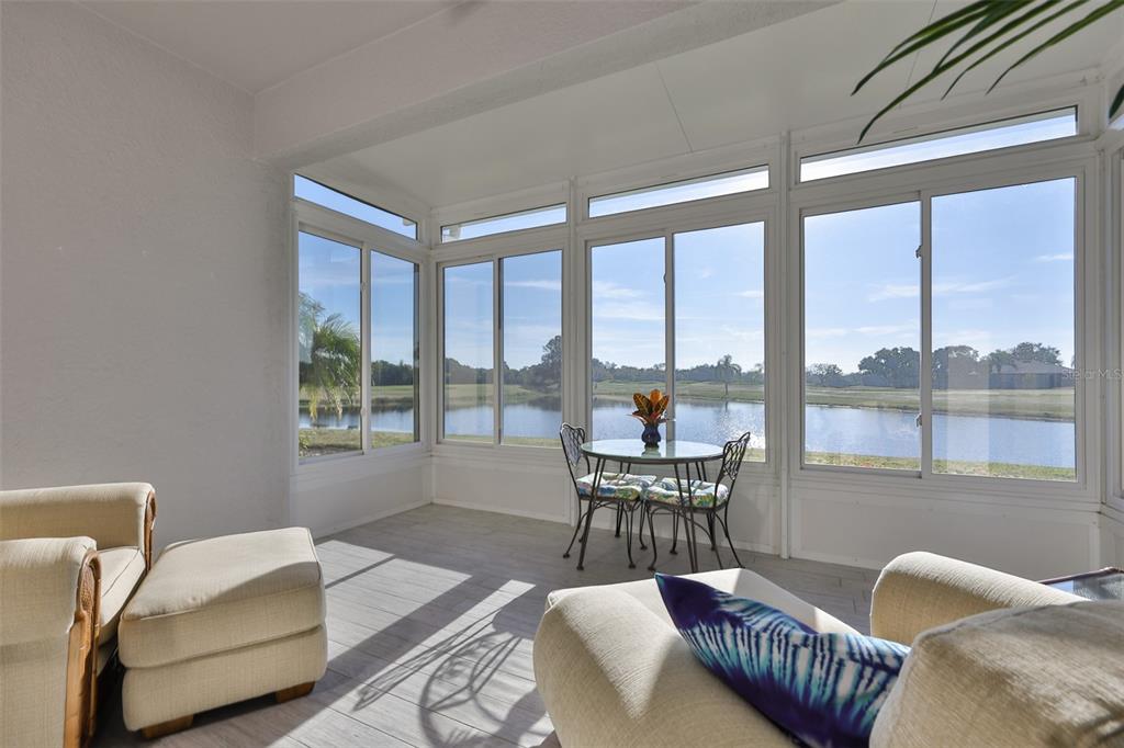 964 Pembroke Point Way Sun City Center, FL 33573 - Photo 21 of 66 a living room with furniture and a window