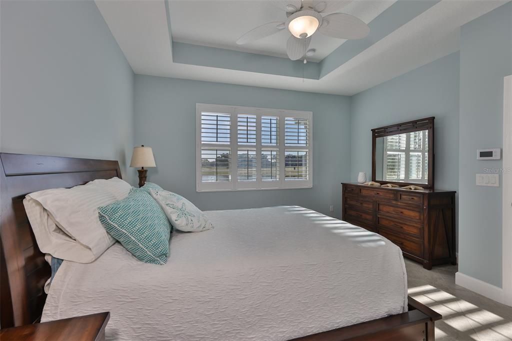 964 Pembroke Point Way Sun City Center, FL 33573 - Photo 28 of 66 a bedroom with a bed and window