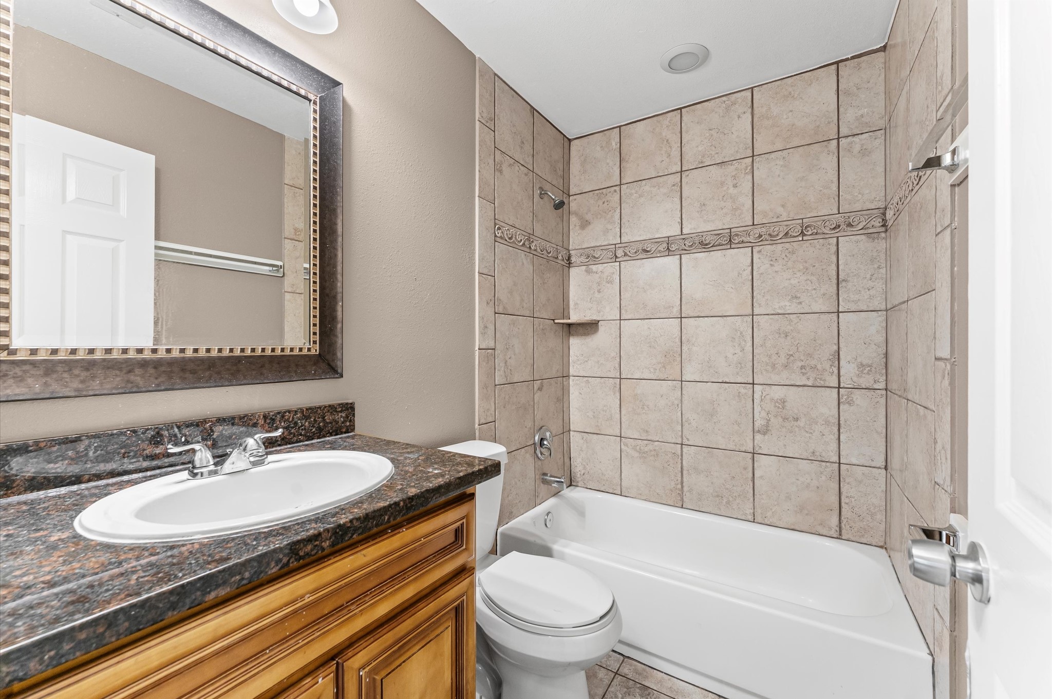 5107 Gren Street Houston, TX 77021 - Photo 13 of 26 a bathroom with a sink toilet and shower