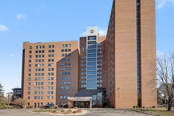 a front view of a building with street view