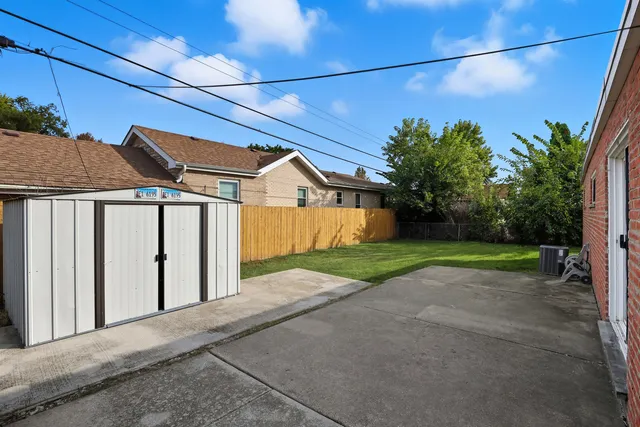 a view of a house with a street