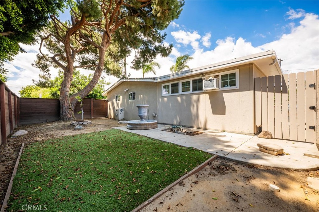 1238 North Studebaker Road Long Beach, CA 90815 - Photo 5 of 47 a backyard of a house with table and chairs