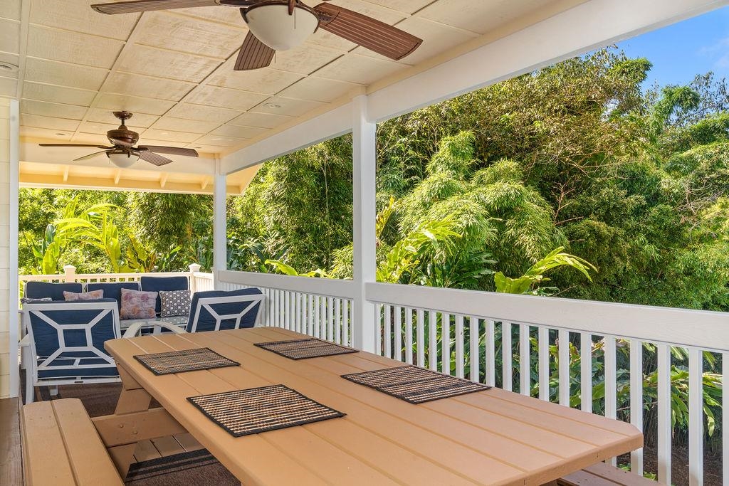 1444 West Kuiaha Road Haiku, HI 96708 - Photo 9 of 30 a view of a patio with a table chairs and a garden