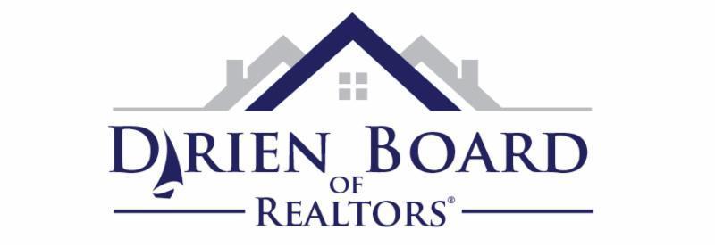 a street sign that is on top of a building